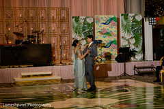 Indian groom dancing with family guest Indian groom dancing with family guest