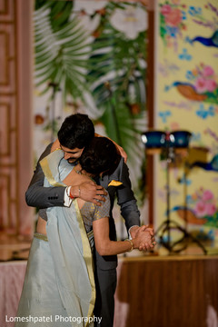 A beautiful moment of the groom and family A beautiful moment of the groom and family