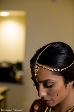 Indian bride wearing the tikka Indian bride wearing the tikka