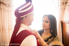 Raja being assisted by family guest Raja being assisted by family guest