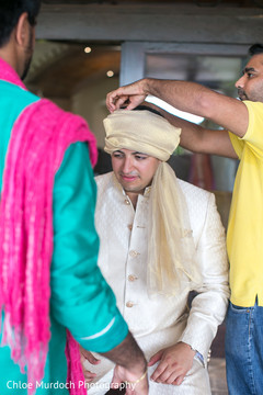Charming rajah getting his turban on. Charming rajah getting his turban on.