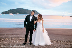 Lovely Indian bride and groom by the beach photo shoot. Lovely Indian bride and groom by the beach photo shoot.