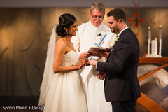 Enchanting Indian bride and groom exchanging rings. Enchanting Indian bride and groom exchanging rings.