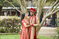 Indian bride and groom's romantic first look moment. Indian bride and groom's romantic first look moment.