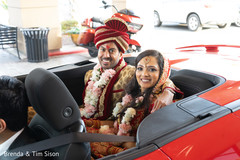 Joyful Indian couple on their wedding vehicle. Joyful Indian couple on their wedding vehicle.