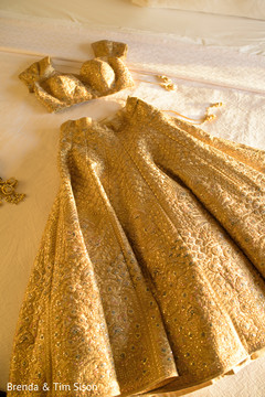 Incredible golden lehenga for maharani's reception party. Incredible golden lehenga for maharani's reception party.