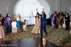 Indian couple entering their wedding reception. Indian couple entering their wedding reception.