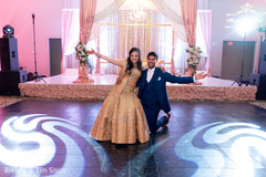 Adorable indian couple showing some dance moves. Adorable indian couple showing some dance moves.
