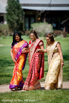 Indian bride and bridesmaids entering the venue Indian bride and bridesmaids entering the venue