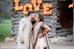 Indian bride and groom during pictures Indian bride and groom during pictures