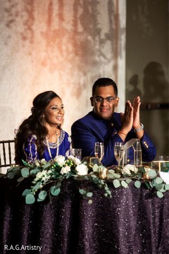 Couple during speeches Couple during speeches
