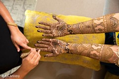 Bride during the mehndi design Bride during the mehndi design