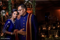 Indian bride and groom posing for the photo session Indian bride and groom posing for the photo session