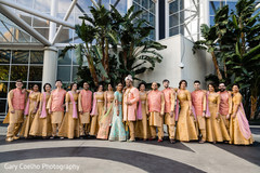 Joyful indian bride and groom with bridesmaids and groomsmen photo. Joyful indian bride and groom with bridesmaids and groomsmen photo.