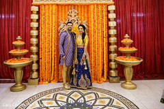 Indian couple posing at sangeet party. Indian couple posing at sangeet party.