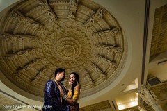 Glamorous indian couple on sangeet outfits. Glamorous indian couple on sangeet outfits.