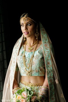 Enchanting Indian bride on her ceremony lehenga. Enchanting Indian bride on her ceremony lehenga.