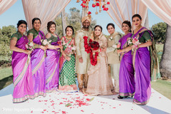 Indian couple with bridesmaids Indian couple with bridesmaids