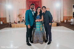 Lovely shot of the couple and special guest Lovely shot of the couple and special guest