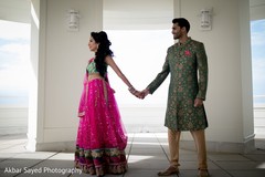 Indian bride and groom at their sangeet outfits. Indian bride and groom at their sangeet outfits.