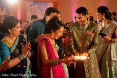 Maharani and rajah with sacred fire at sangeet. Maharani and rajah with sacred fire at sangeet.