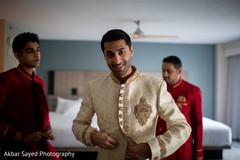 Rajah getting his ceremony sherwani on. Rajah getting his ceremony sherwani on.
