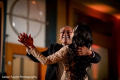Cute indian bride dancing with her father. Cute indian bride dancing with her father.