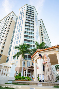 Indian couple by the venue Indian couple by the venue