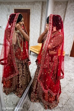 Maharani getting her ceremony earrings on. Maharani getting her ceremony earrings on.