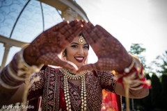 Sweet Indian bride with her ceremony makeup capture. Sweet Indian bride with her ceremony makeup capture.