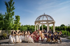 Fun Indian couple with bridesmaids and groomsmen photo. Fun Indian couple with bridesmaids and groomsmen photo.