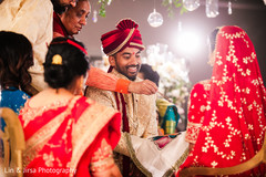 Indian couple being blessed during ceremony. Indian couple being blessed during ceremony.
