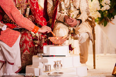Indian couple lights the sacred fire. Indian couple lights the sacred fire.
