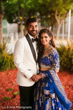 Elegant Indian bride and groom's wedding reception fashion. Elegant Indian bride and groom's wedding reception fashion.
