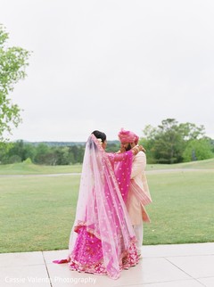 Indian bride and groom during the photo shoot Indian bride and groom during the photo shoot