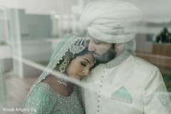 Indian bride and groom having a tender moment Indian bride and groom having a tender moment
