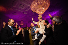 Indian groom celebrating during reception party. Indian groom celebrating during reception party.