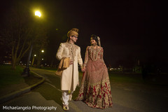 Indian bride and groom walking out from the ceremony isle Indian bride and groom walking out from the ceremony isle