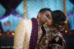 Indian bride and groom posing for pictures Indian bride and groom posing for pictures