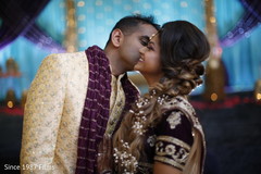 Indian bride and groom having a romantic moment Indian bride and groom having a romantic moment
