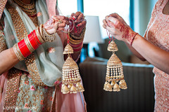 Indian bride getting ready putting her Kalires Indian bride getting ready putting her Kalires