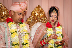 Indian couple wearing garlands. Indian couple wearing garlands.