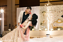 Glamorous Indian bride and groom dancing. Glamorous Indian bride and groom dancing.