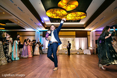 Joyful Indian wedding guests dancing Joyful Indian wedding guests dancing