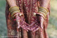 Beautiful indian bride showing henna art Beautiful indian bride showing henna art