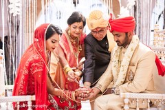 Indian bride and groom getting married Indian bride and groom getting married