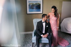 Indian bride and groom posing for pictures Indian bride and groom posing for pictures
