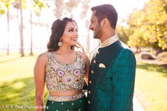 Maharani and Indian groom smiling during pictures Maharani and Indian groom smiling during pictures