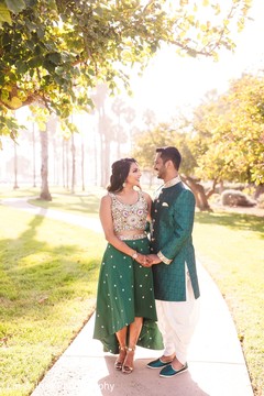 Indian couple posing for pictures Indian couple posing for pictures