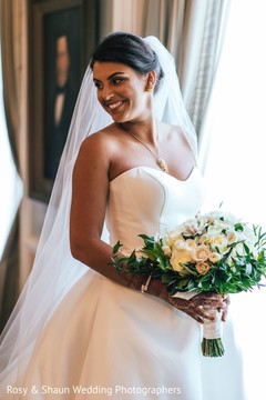 Indian bride glowing in her wedding attire. Indian bride glowing in her wedding attire.